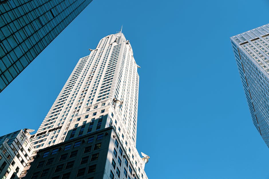 Chrysler Building soaring against a clear blue sky, showcasing iconic New York City architecture.