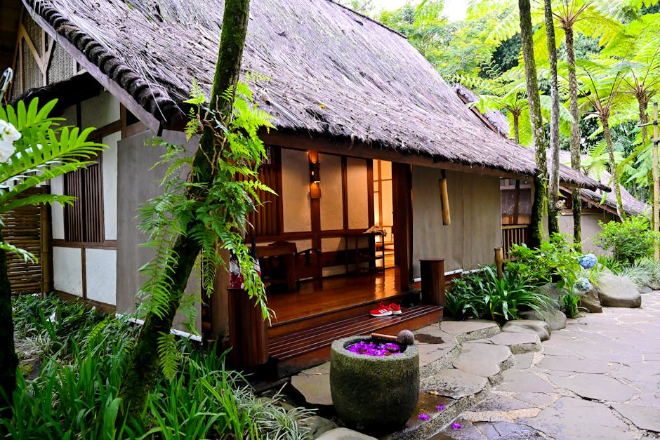 A serene bamboo hut nestled in a lush jungle setting in West Java, Indonesia.
